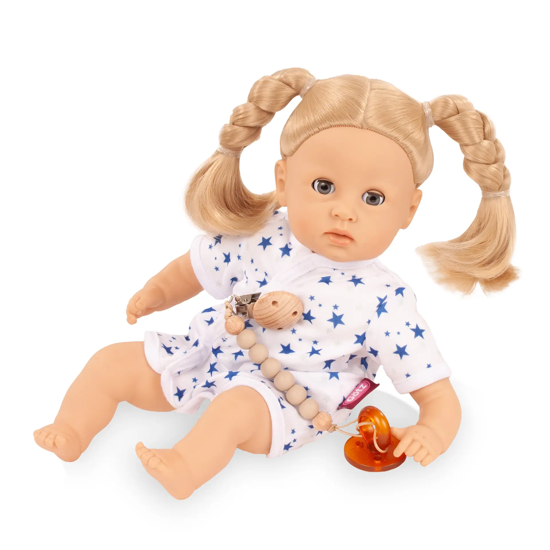 Set Body Gr. 30-33 cm mit Sternmotiv in blau-weiß und ein Schnuller mit Schnullerkette, angezogen. Von Goetz
