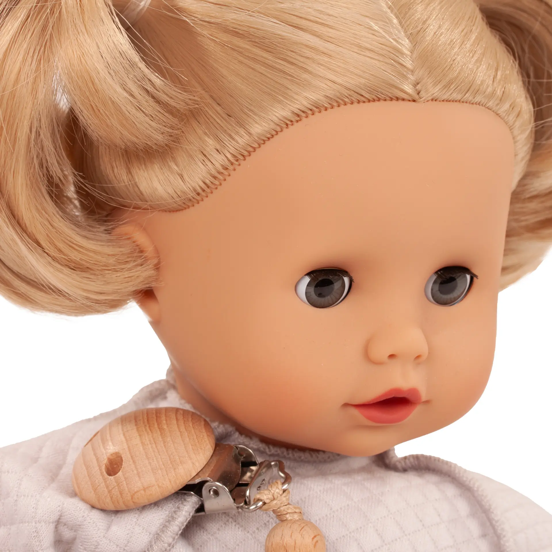 Portrait von Babypuppe Gr. 30-33 cm mit blondem Haar und blauen Schlafaugen von Goetz