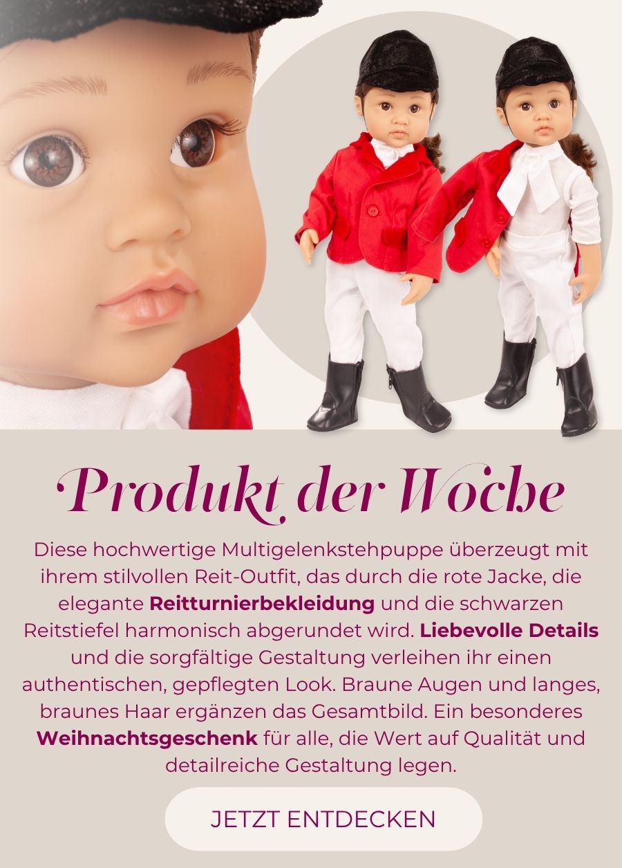 Stehpuppe Gr. 36 cm mit braunen Augen und braunem langen Haar. Sie traegt eine Reitturnierkleidung in rot und weiss, dazu eine schwarze Reitcappy und Reitstiefeln von Goetz
