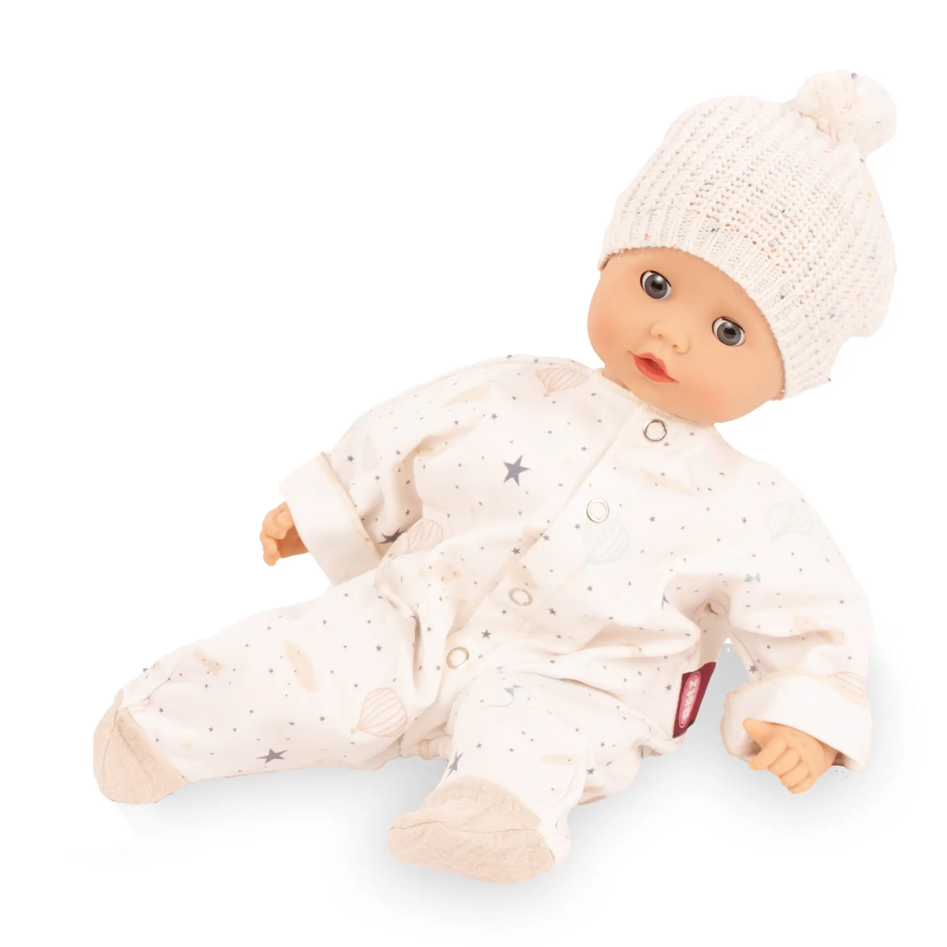 Kombi Strampler mit Strickmuetze Gr. 30-33 cm in beige mit Sternen und Ballons als Aufdruck, dazu eine Strickmuetze, angezogen. Von Goetz