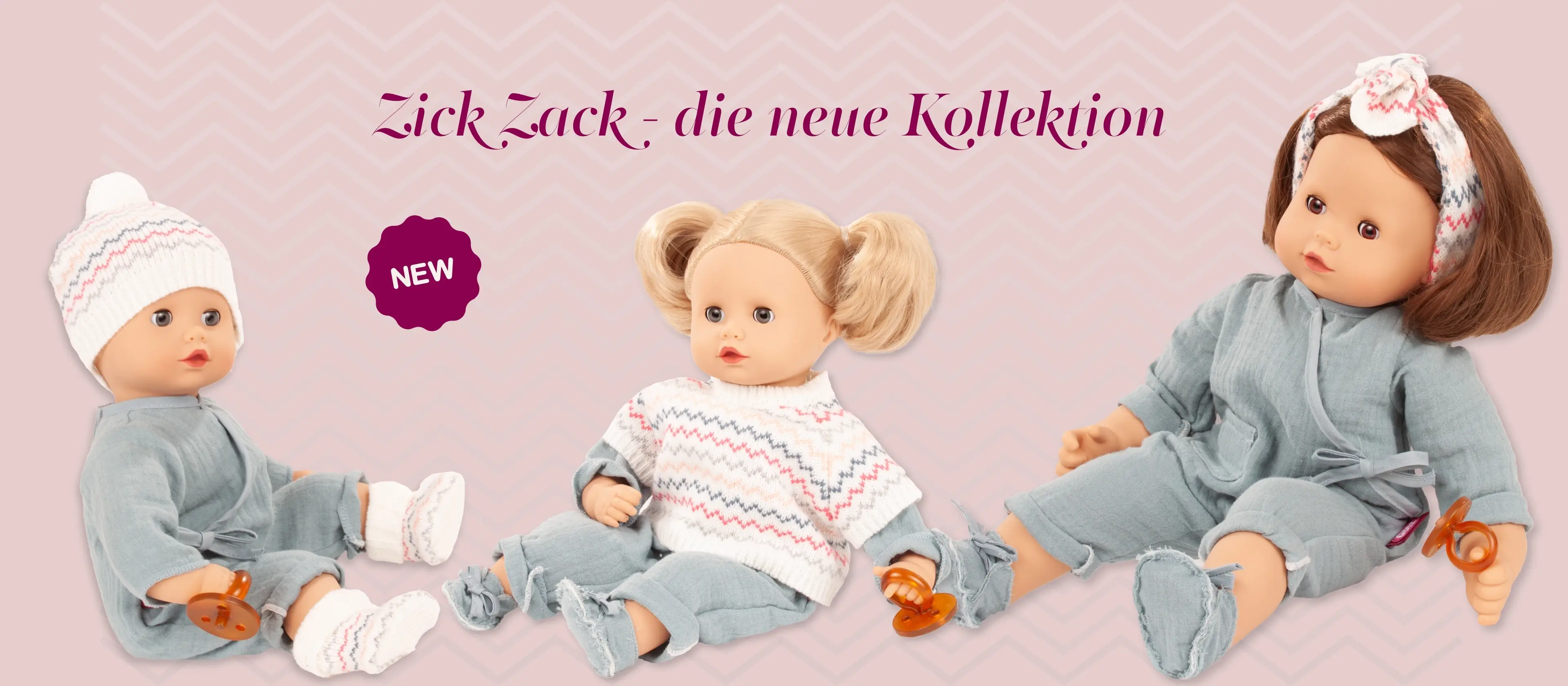 Babypuppen Gr. 30-33 cm und 42 cm in hellblauen Anzügen mit Stick-Accessoires im Zick Zack-Design von Goetz