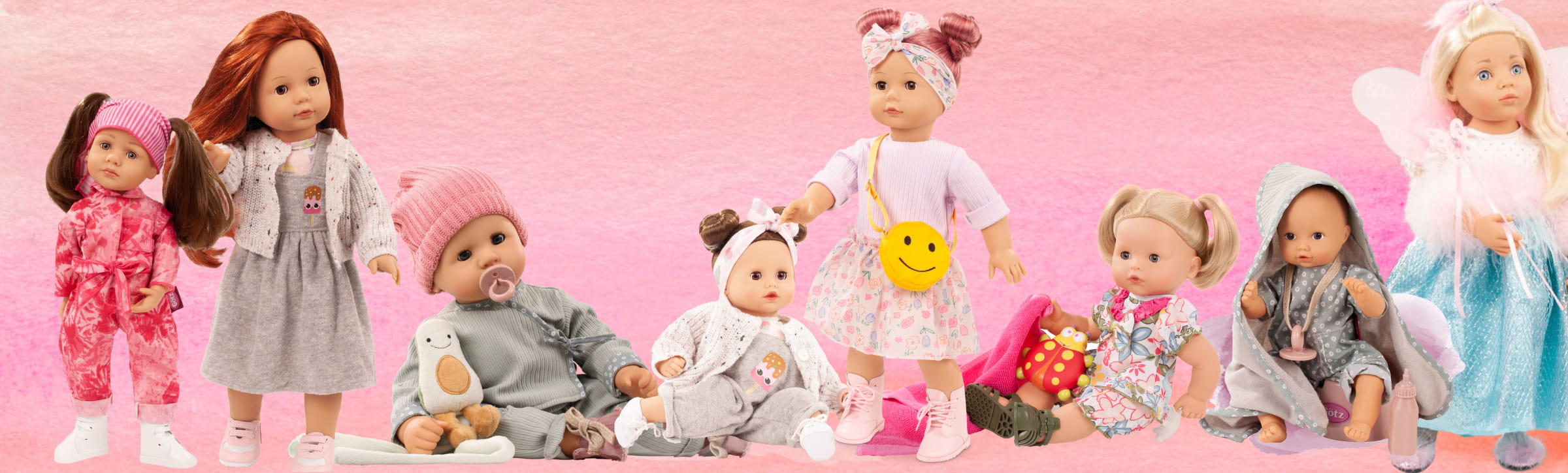 Stehpuppen und babypuppen von Götz in einer Gruppenanordnung  Stehpuppen und babypuppen von Götz in einer Gruppenanordnung