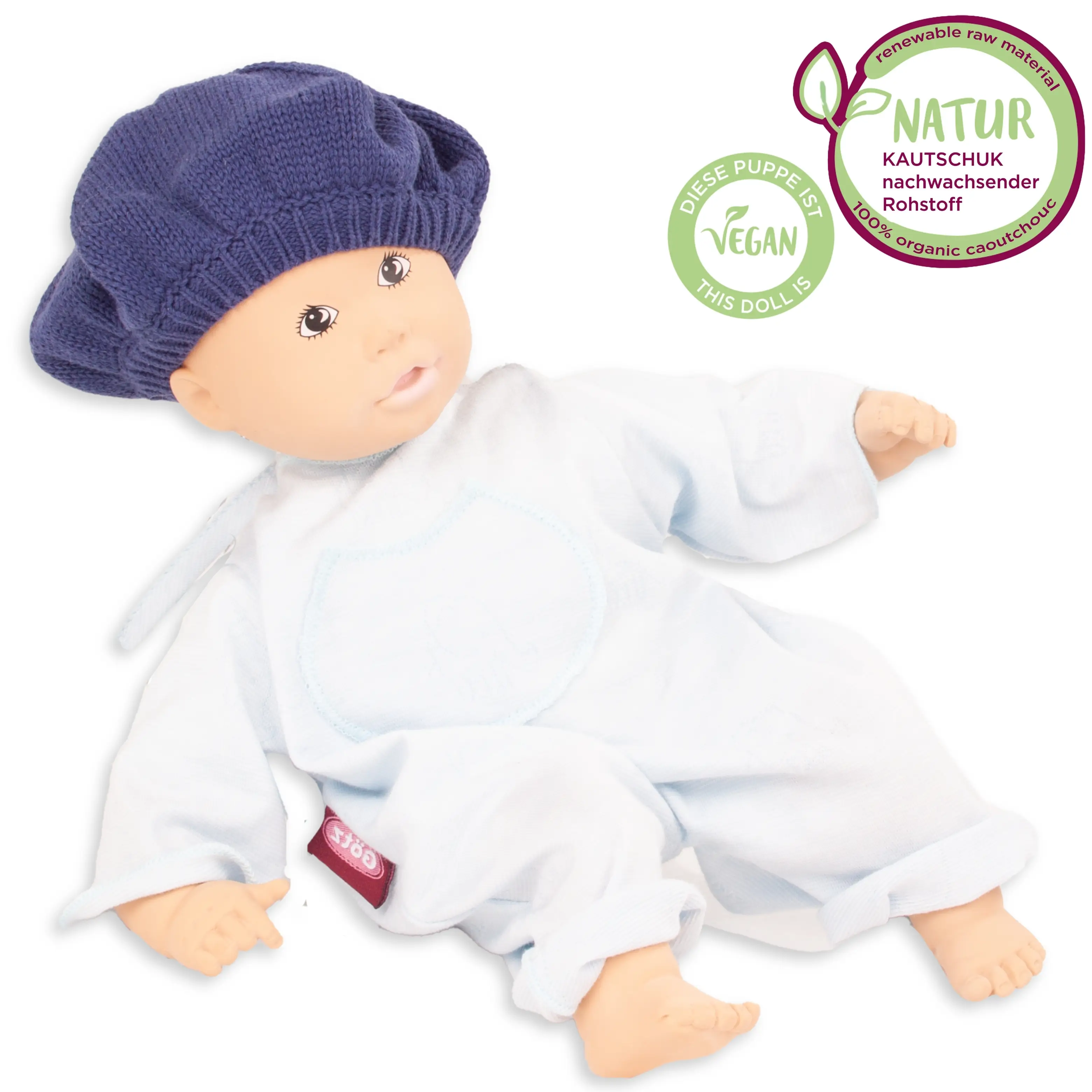 Babypuppe 33 cm aus Naturkautschuk und vegan mit gemalten Augen und einem blauen Strampler und Strickmuetze von Goetz