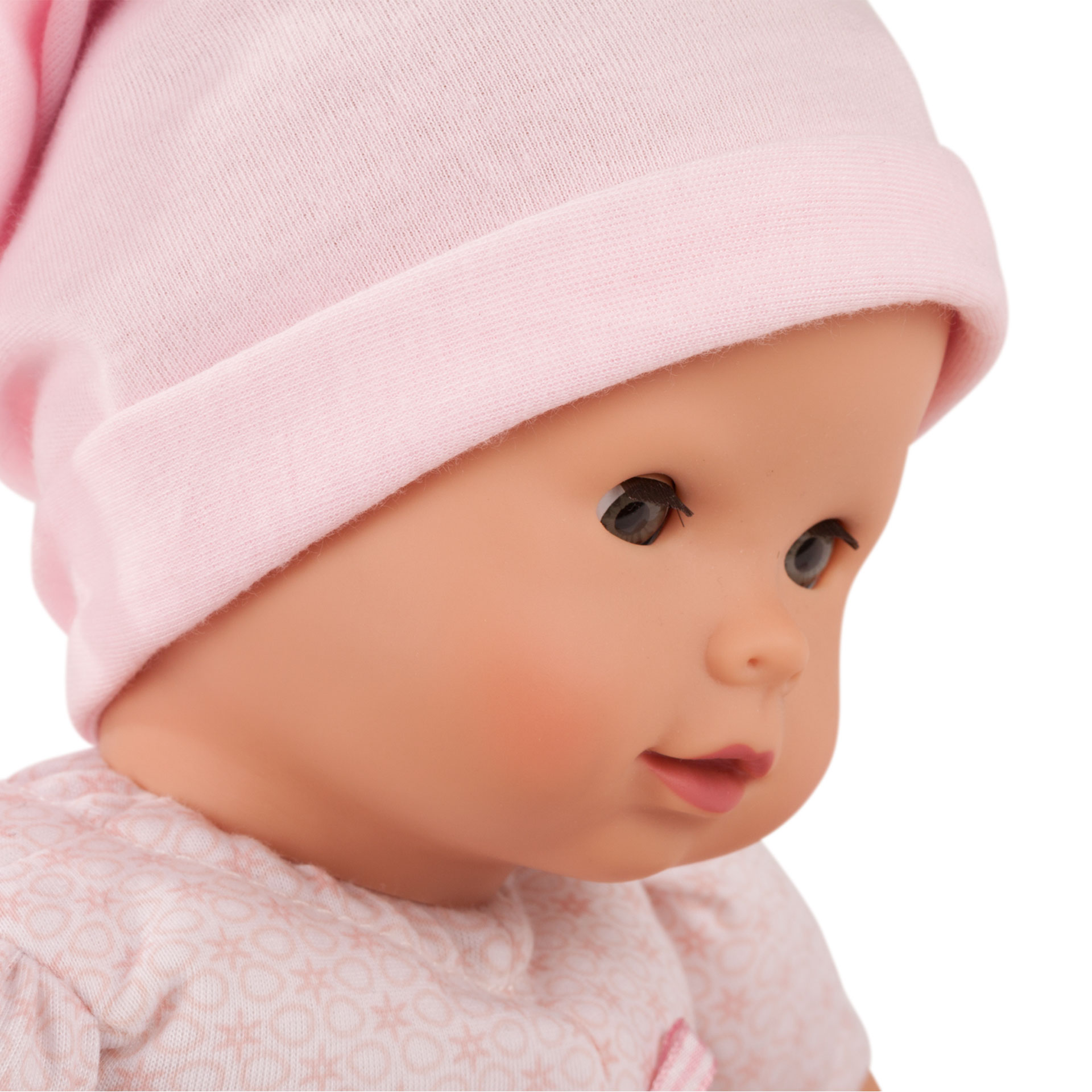 1527979-maxy-muffin-to-dress-babypuppe-goetz-portrait-seitl goetz maxy muffin to dress blaue schlafaugen ohne haare rosa zipfelmuetze
