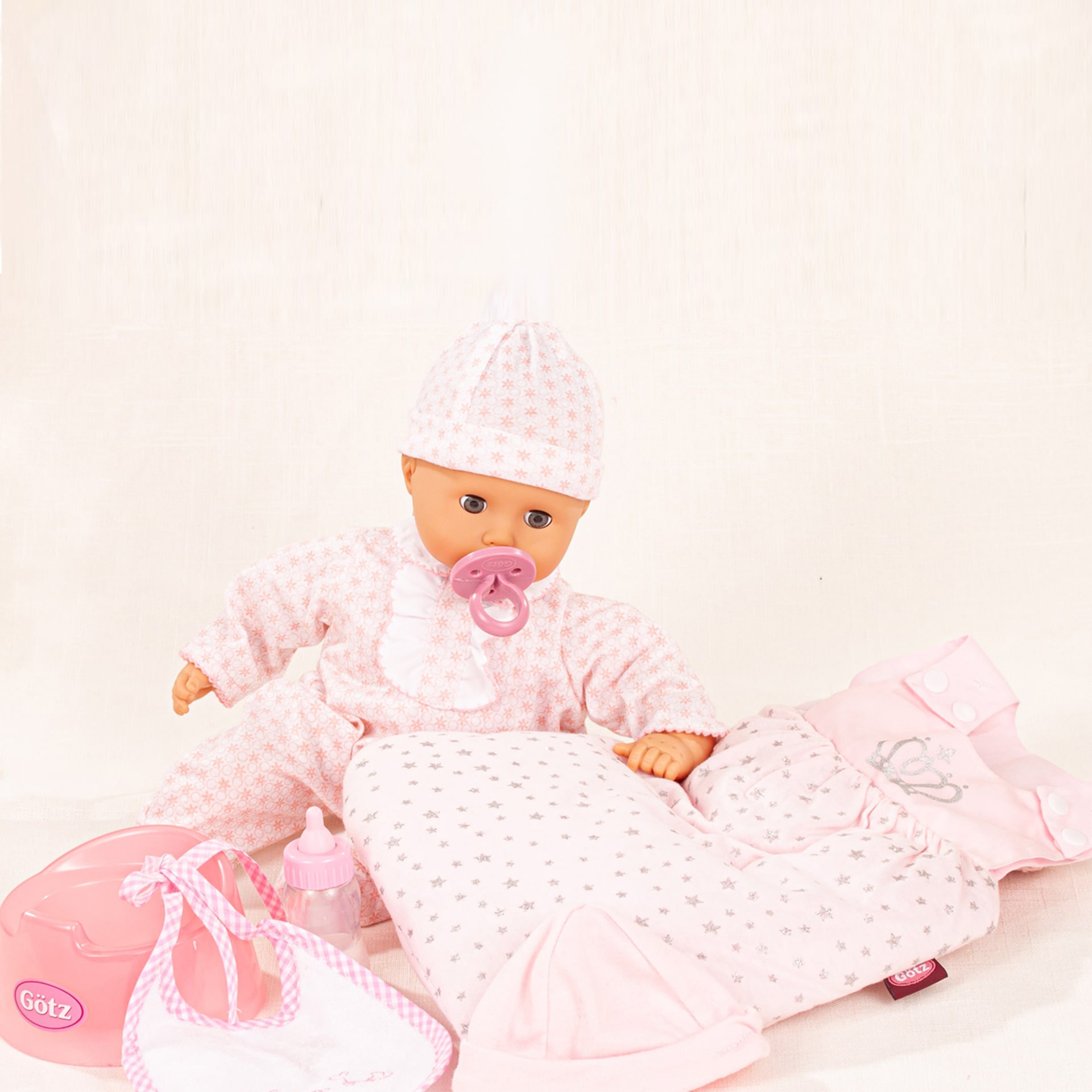 33 cm grosse Babypuppe mit Schlafsack, Laetzchen, Toepfchen, Schnuller, Muetze und Strampler