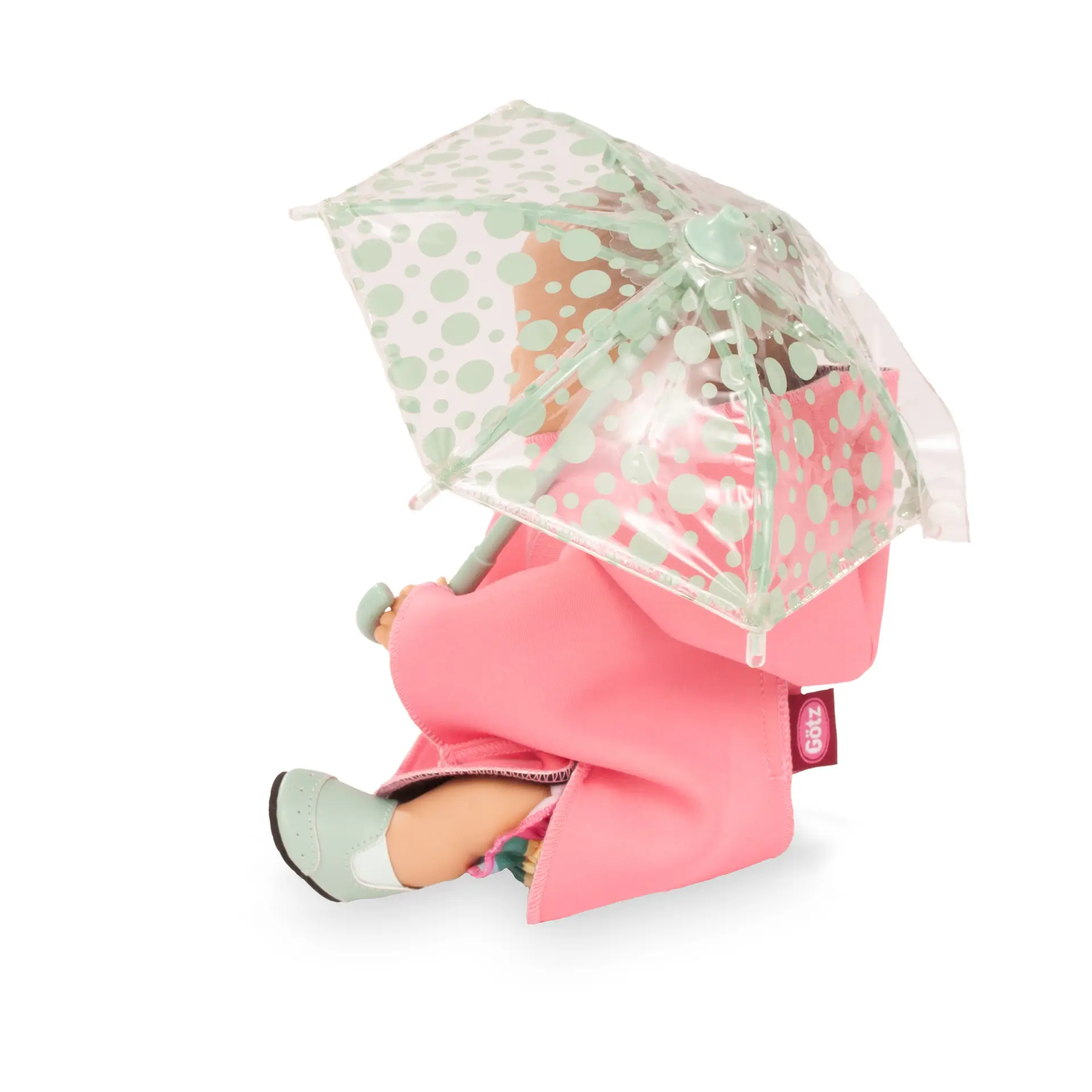 Badepuppe Gr. 30-33 cm ohne Haare, Pipi- und Trinkfunktion. Dazu einen Regenschirm mit Neopren-Regencape und tuerkisfarbenen Stiefeln von Goetz