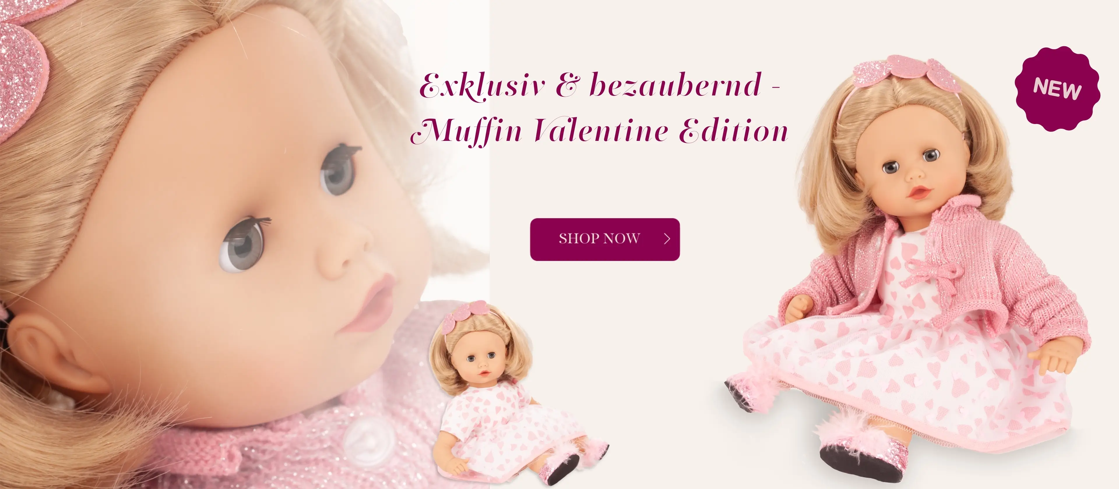 Babypuppe Gr. 30-33 cm mit blonden Haaren und blauen Schlafaugen. Sie ist eine Sonderedition mit rosa-weissem Kleid und rosa Glitzer-Strickjacke von Goetz